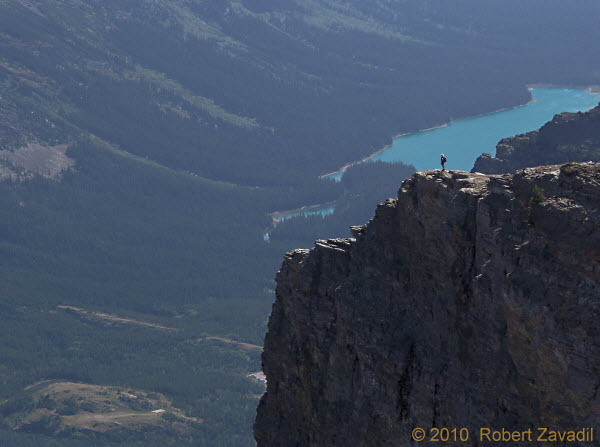 Photo of Hiker Overlooking Josephine Lake in Glacier National Park