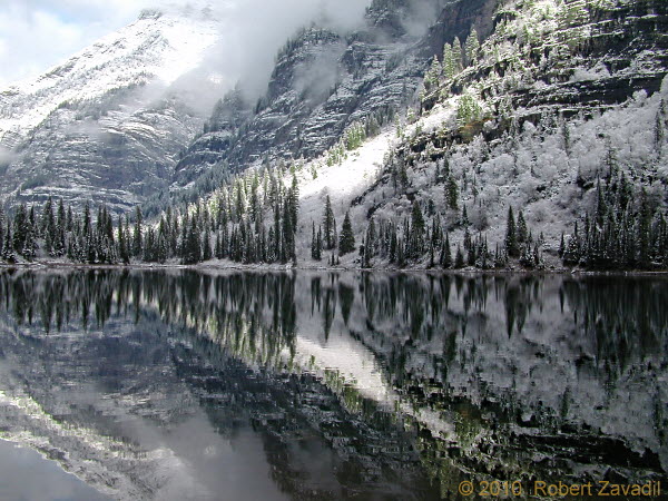 Photo of winter Avalanche Lake in Glacier National Park